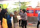 Atasi Kekeringan, Polres Ngawi Bangun Sumur Bor Presisi dan Bagikan Bansos di Kasreman
